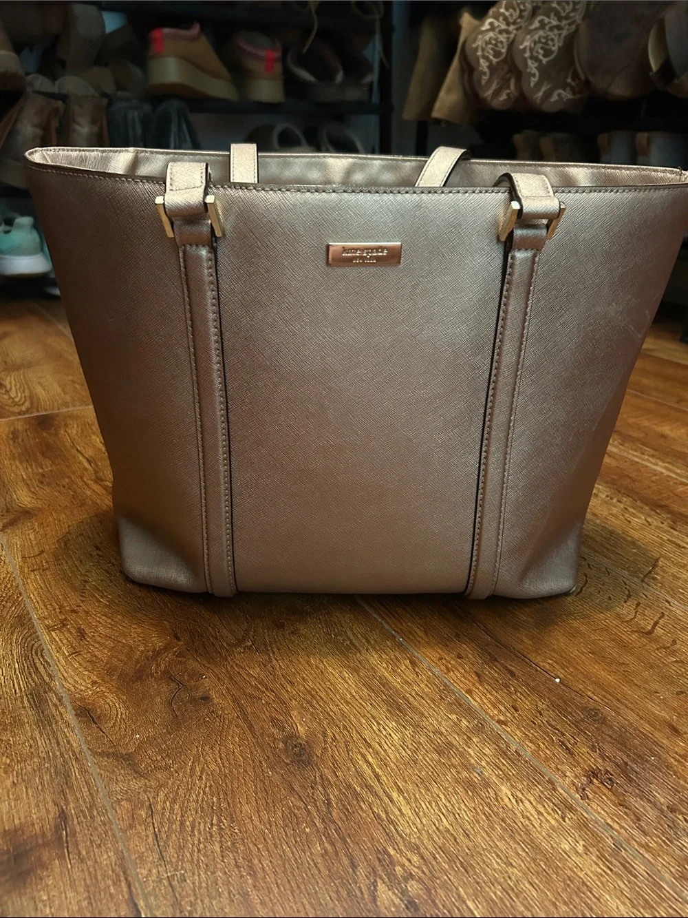 kate spade bronze metallic tote with gold-tone plaque